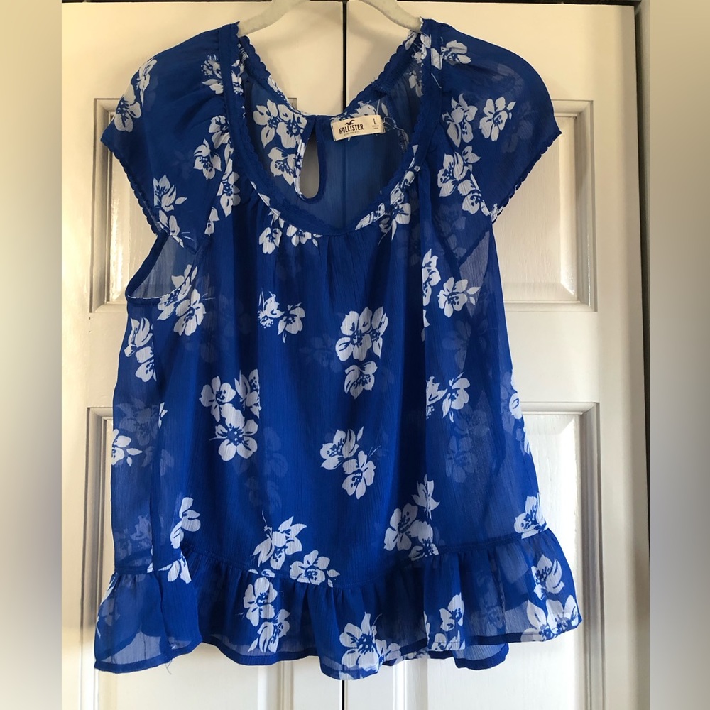 Holister blue & white hibiscus print top
